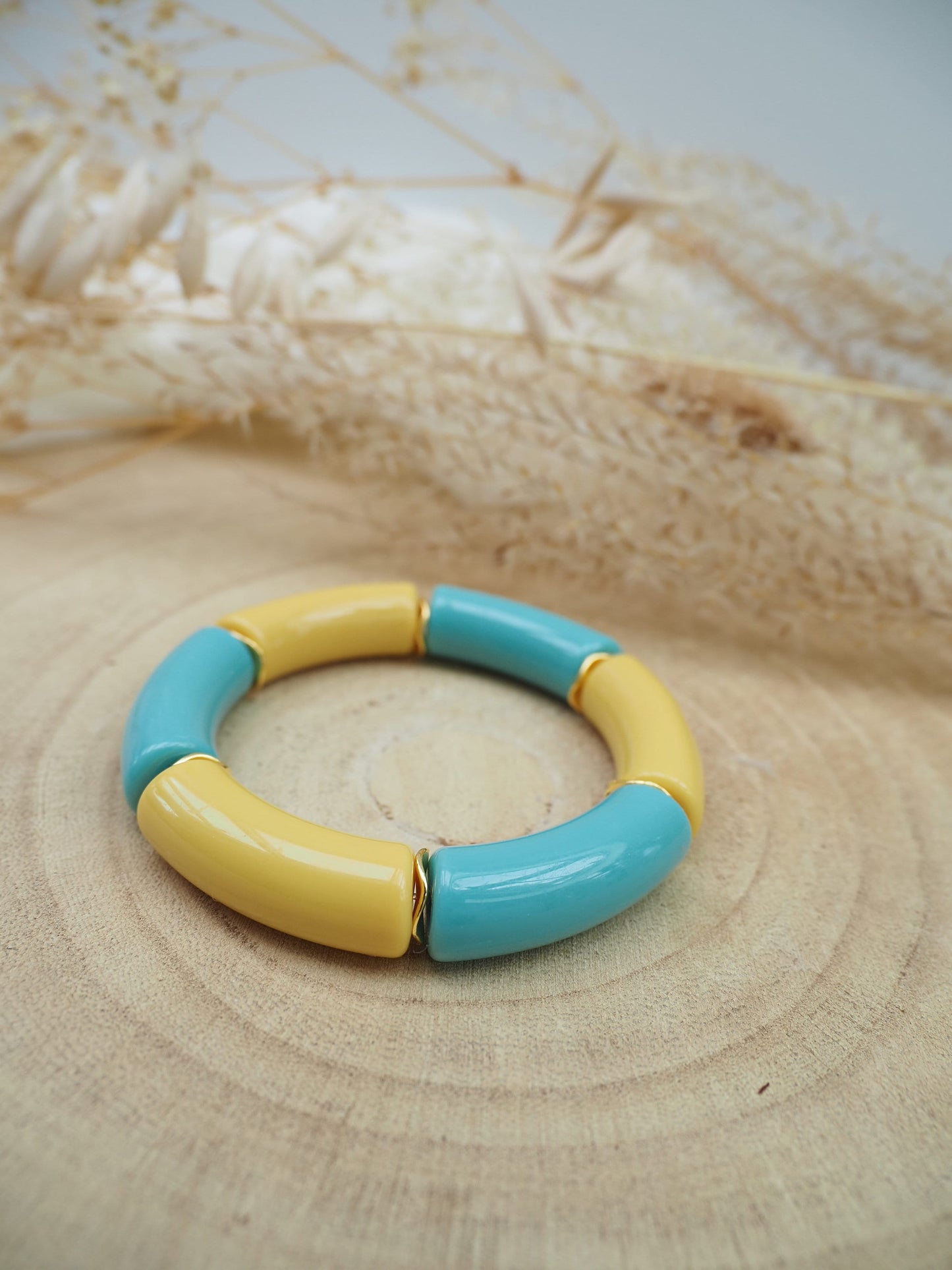 Bracelet jonc bicolore MAELLE / grosses perles tubes en résine acrylique incurvées